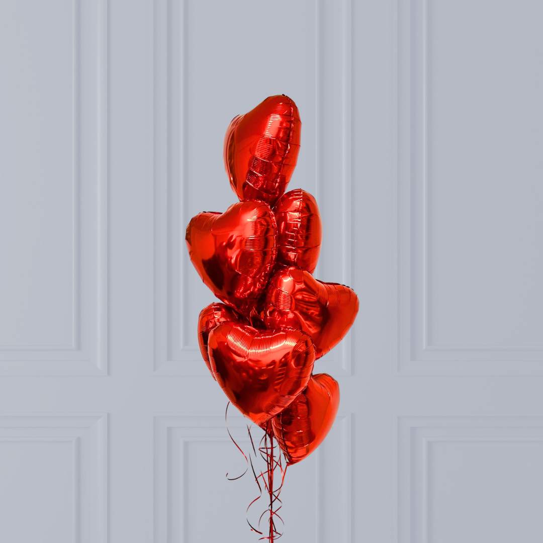 Bouquet d'amour (7 ballons cœurs) à l'hélium