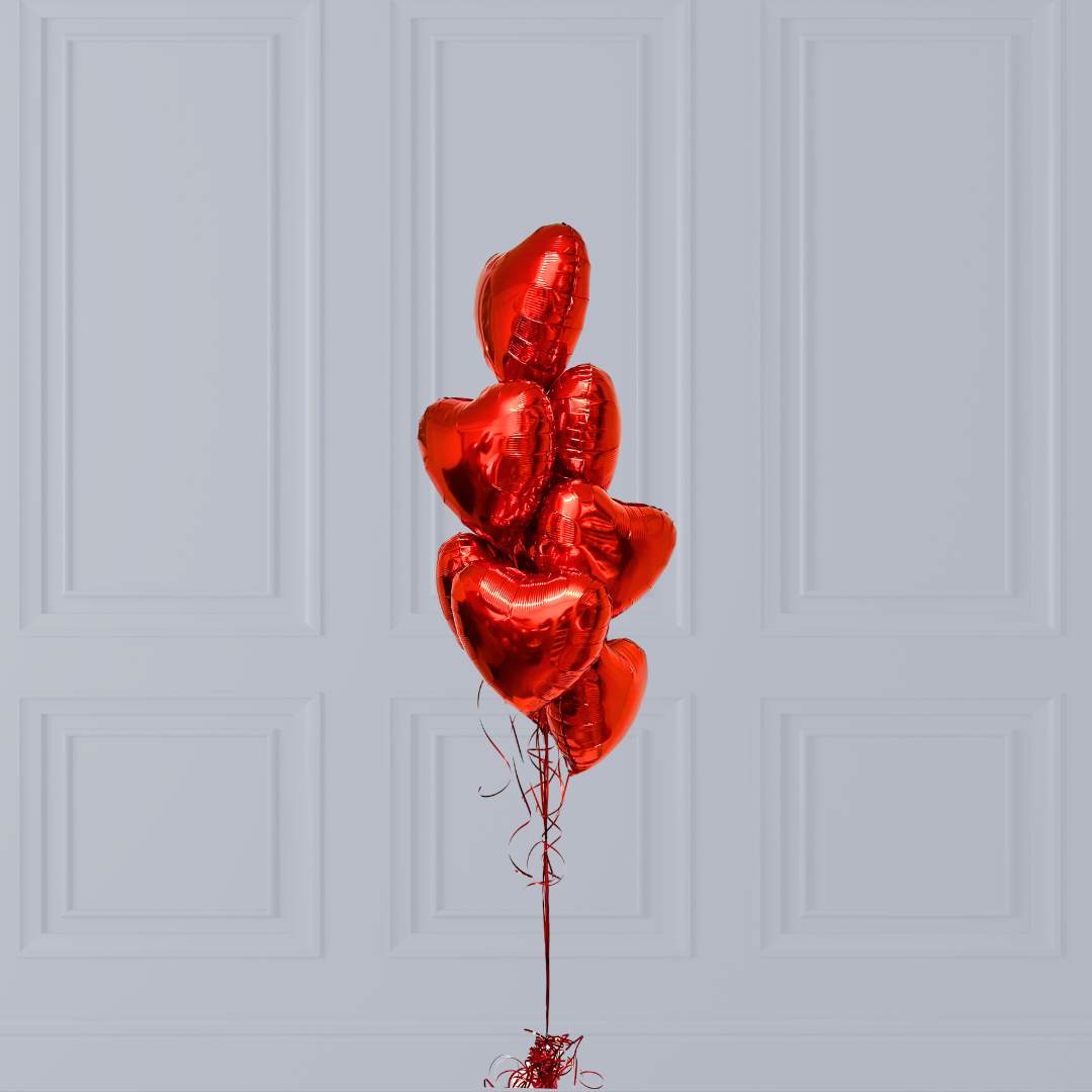 Bouquet d'amour (7 ballons cœurs) à l'hélium